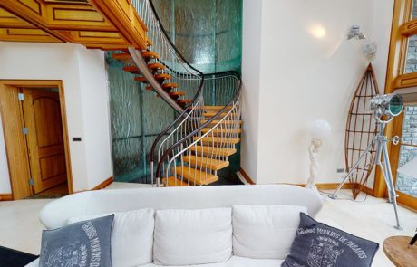 curved staircase in living room